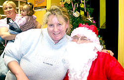 Childminder Cathy Lynch (Finglas)  With santa. Geraldine Kelly, Ballymun in background